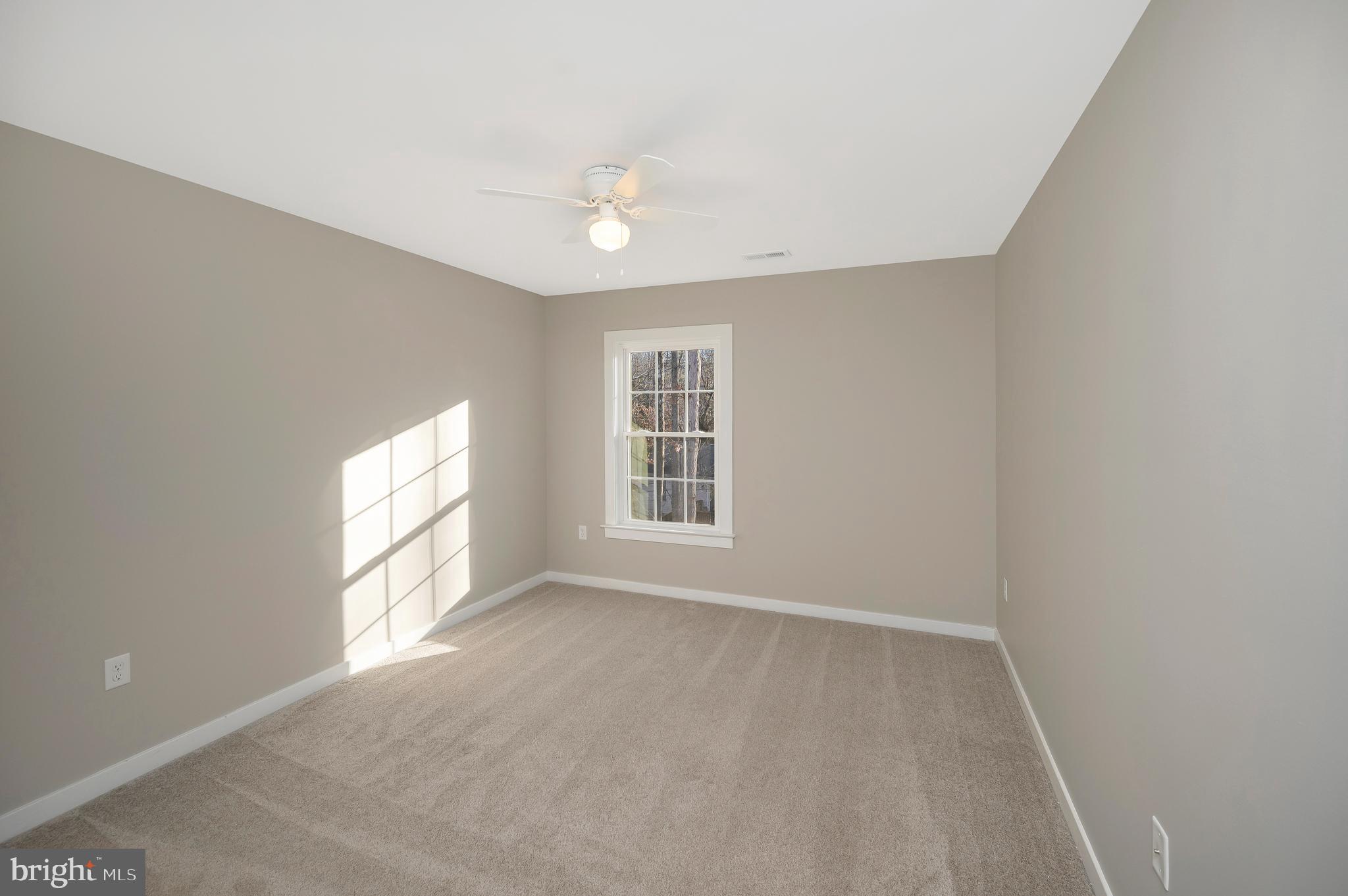 112 Butler Circle Locust Grove, VA 22508 - Photo 30 of 57 an empty room with windows