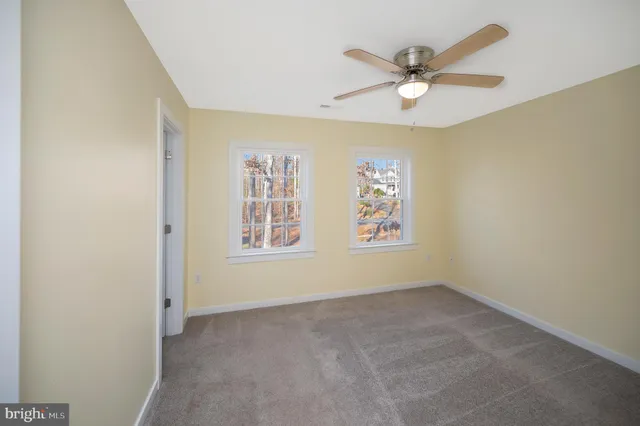 a view of balcony with wooden floor and outdoor seating