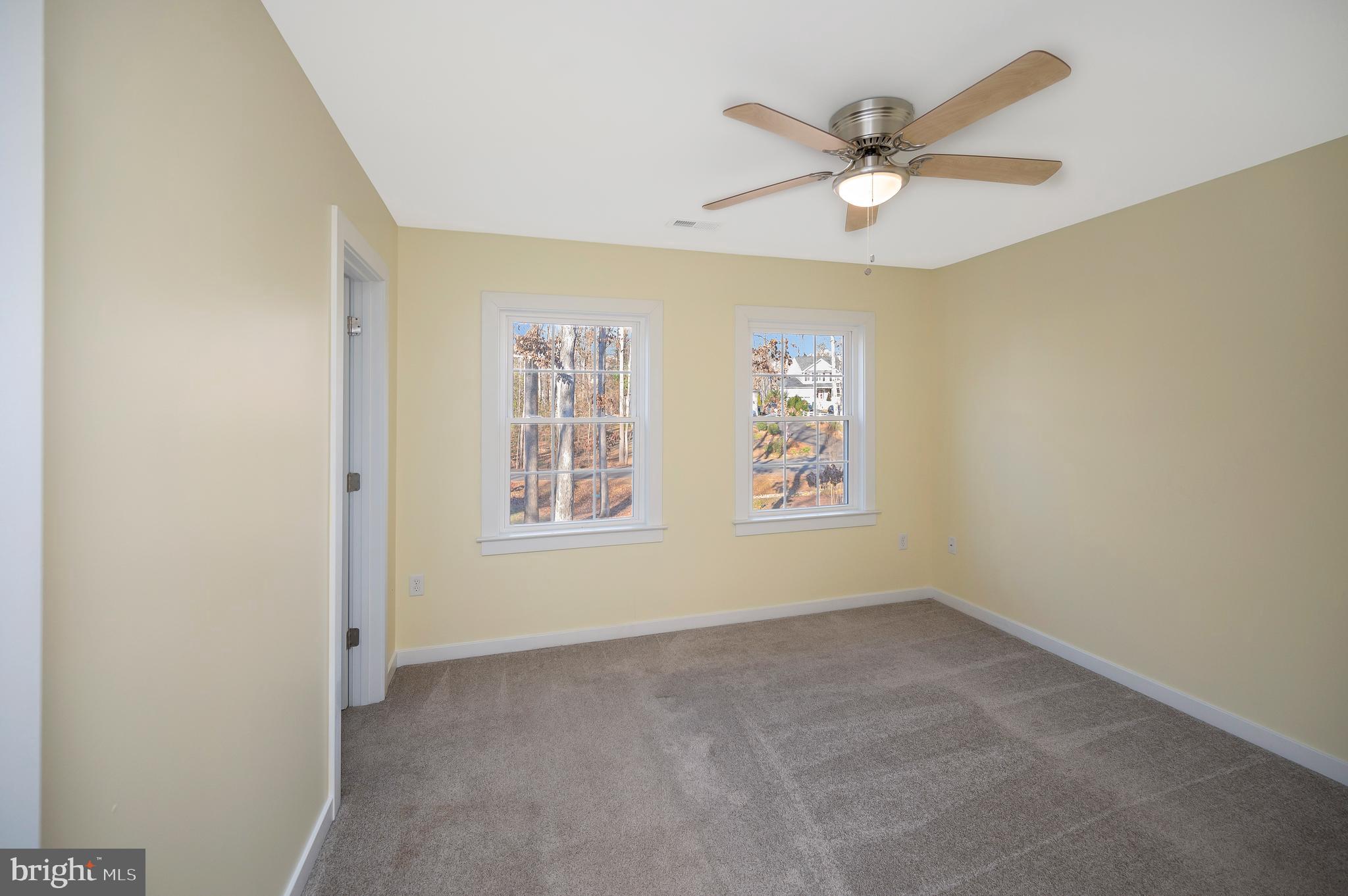 112 Butler Circle Locust Grove, VA 22508 - Photo 32 of 57 an empty room with window and ceiling fan