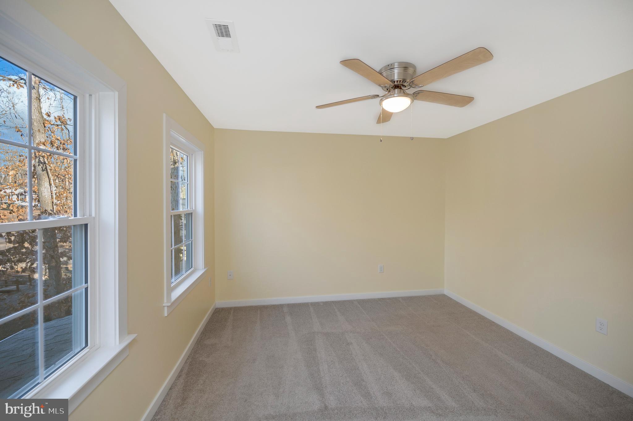 112 Butler Circle Locust Grove, VA 22508 - Photo 33 of 57 wooden floor in an empty room with a window