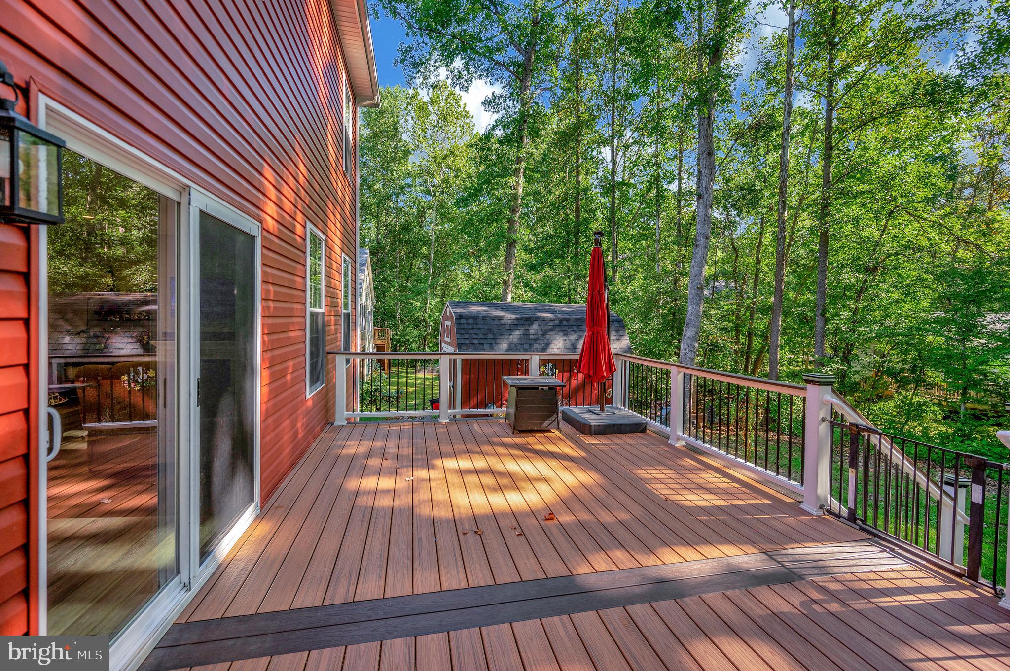 112 Butler Circle Locust Grove, VA 22508 - Photo 35 of 57 a view of balcony with wooden floor and outdoor seating