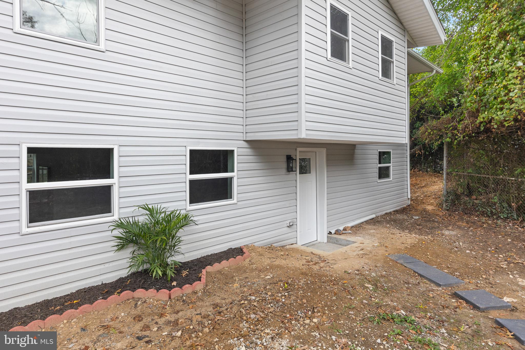 1528 Hunt Avenue Landover, MD 20785 - Photo 27 of 27 a backyard of a white house