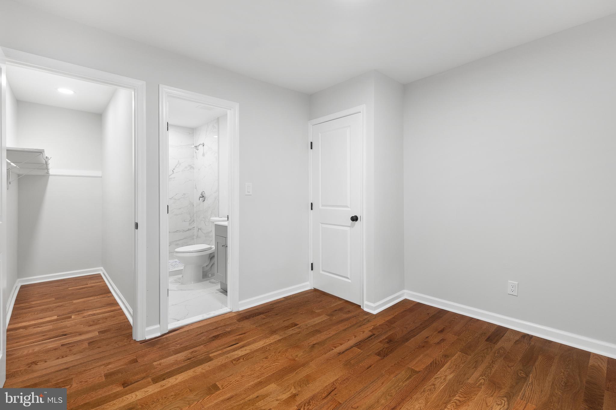 1528 Hunt Avenue Landover, MD 20785 - Photo 9 of 27 a view of empty room with wooden floor