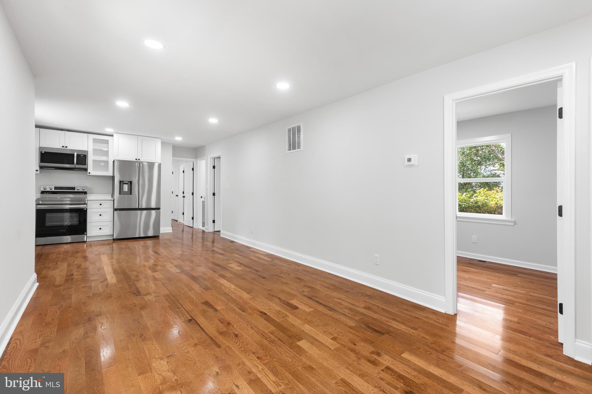 1528 Hunt Avenue Landover, MD 20785 - Photo 10 of 27 a view of a kitchen with a sink and a refrigerator
