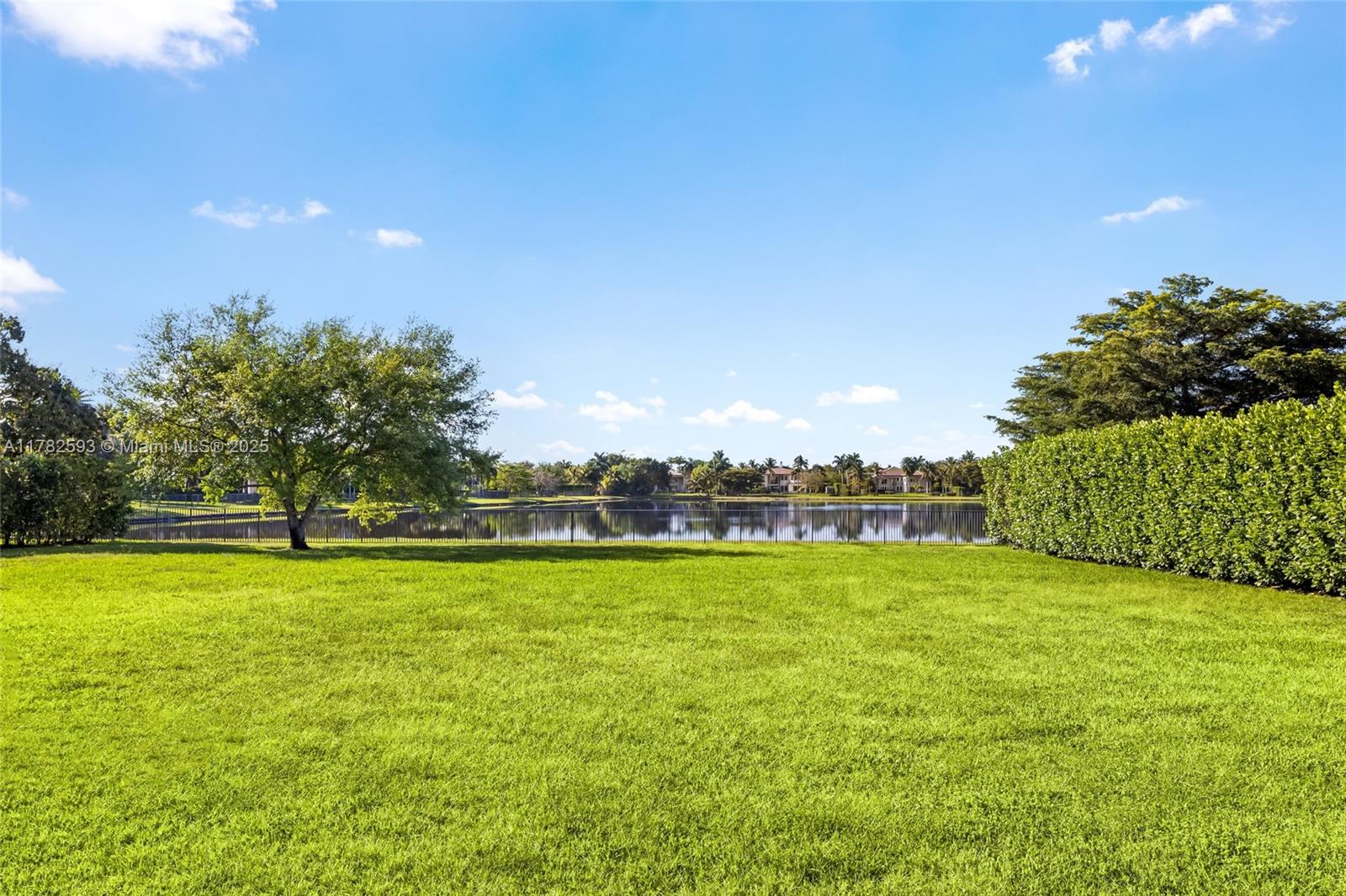 10972 Pine Lodge Trail Davie, FL 33328 - Photo 21 of 21 a view of a big yard with a large trees
