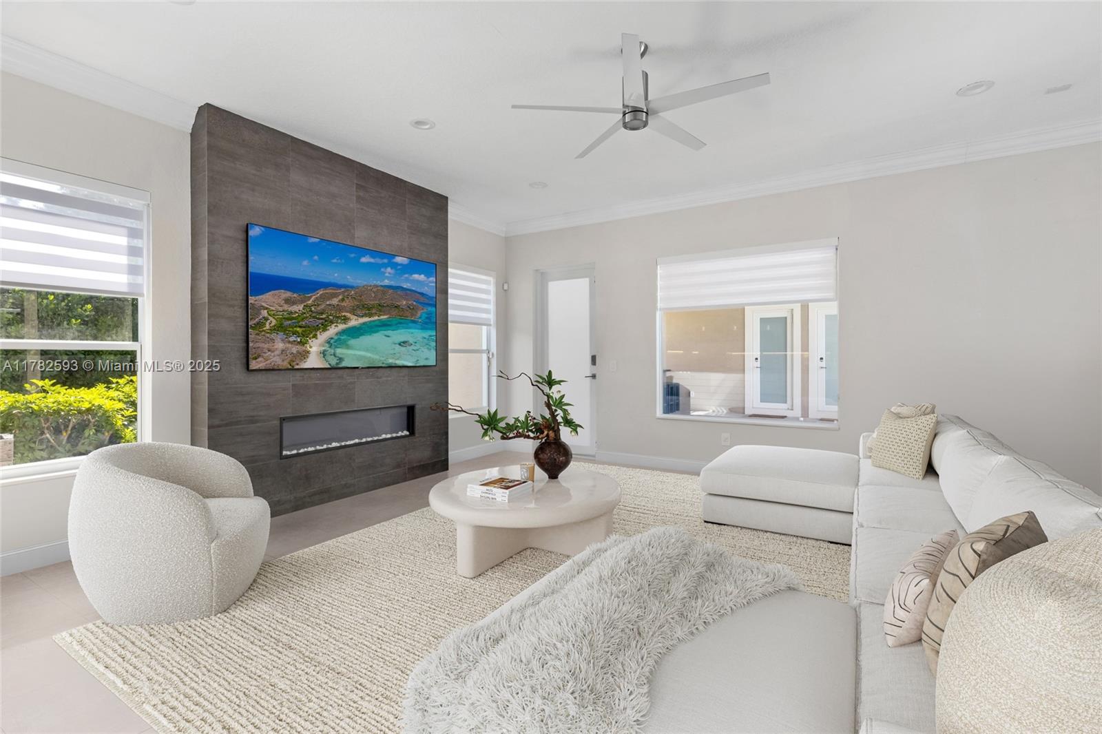 10972 Pine Lodge Trail Davie, FL 33328 - Photo 5 of 21 a living room with furniture and a flat screen tv