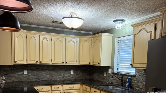 a view of room with cabinets