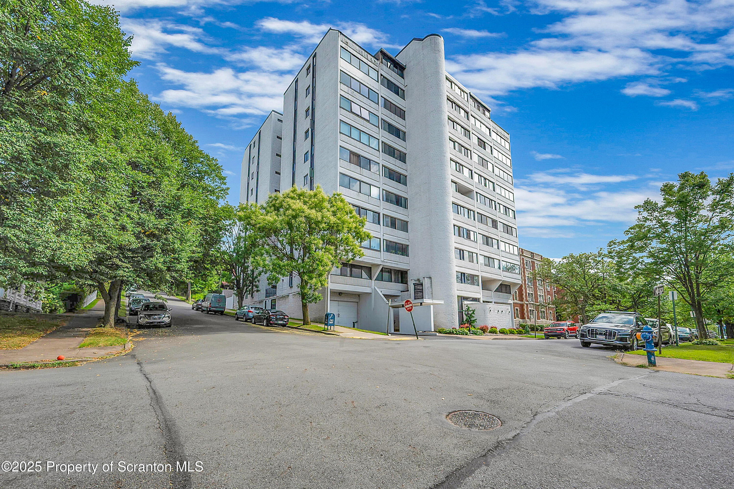550 Clay Avenue, Unit 3B Scranton, PA 18510 - Photo 5 of 17 a city street lined with buildings and cars
