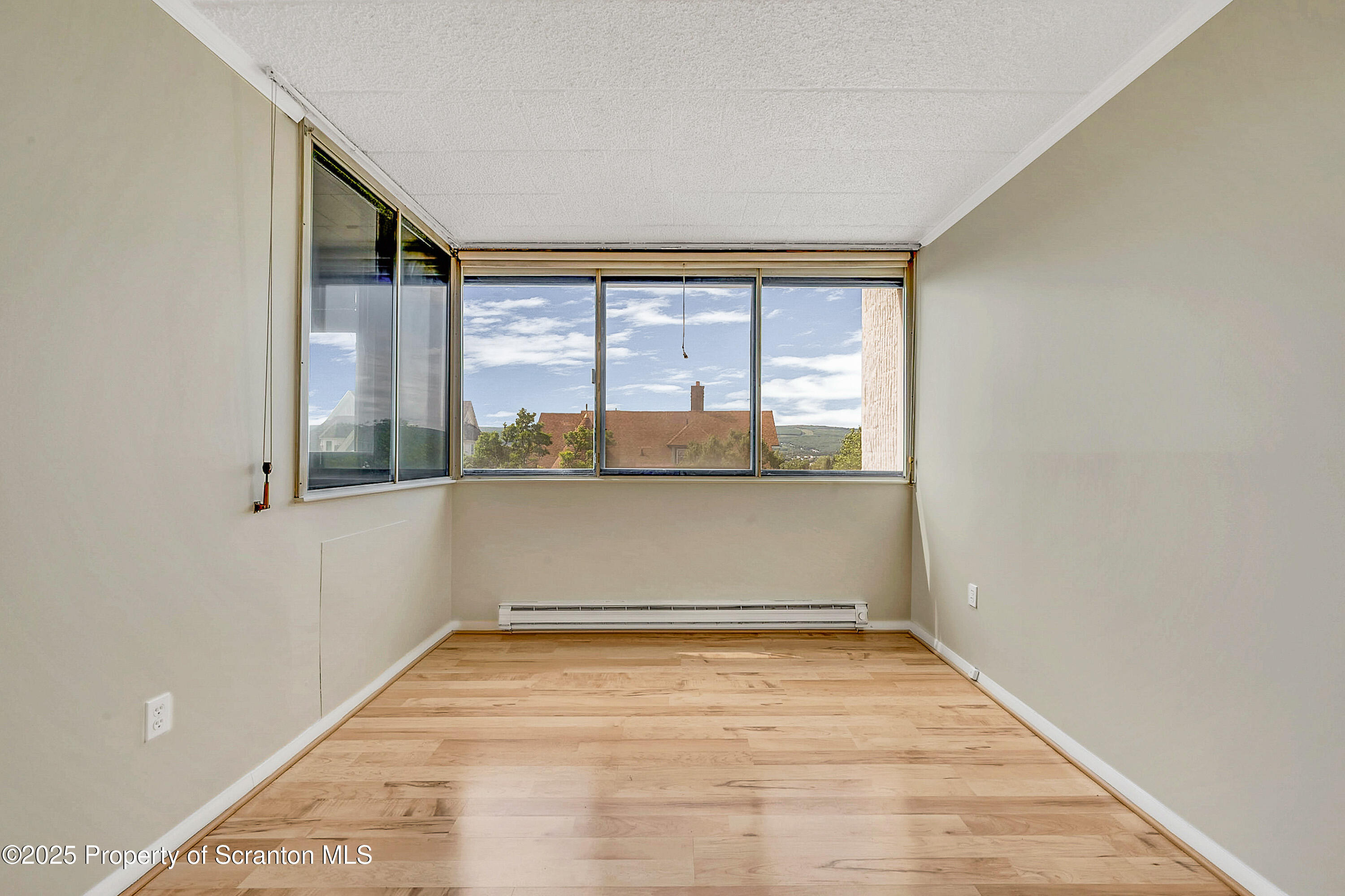 550 Clay Avenue, Unit 3B Scranton, PA 18510 - Photo 6 of 17 a view of an empty room with a window