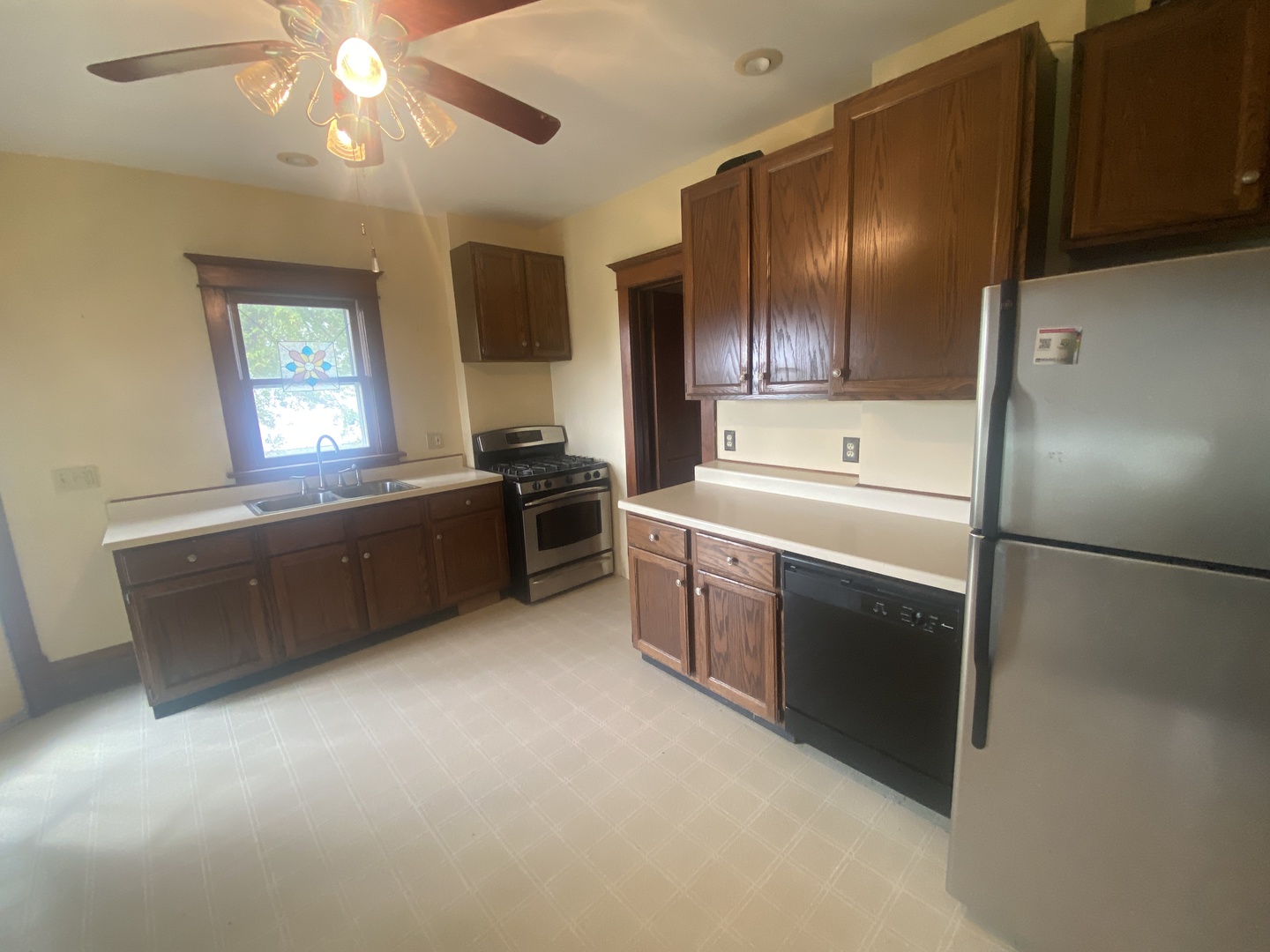 4684 Perry Road Malta, IL 60150 - Photo 14 of 36 a view of an empty room with a window and wooden floor