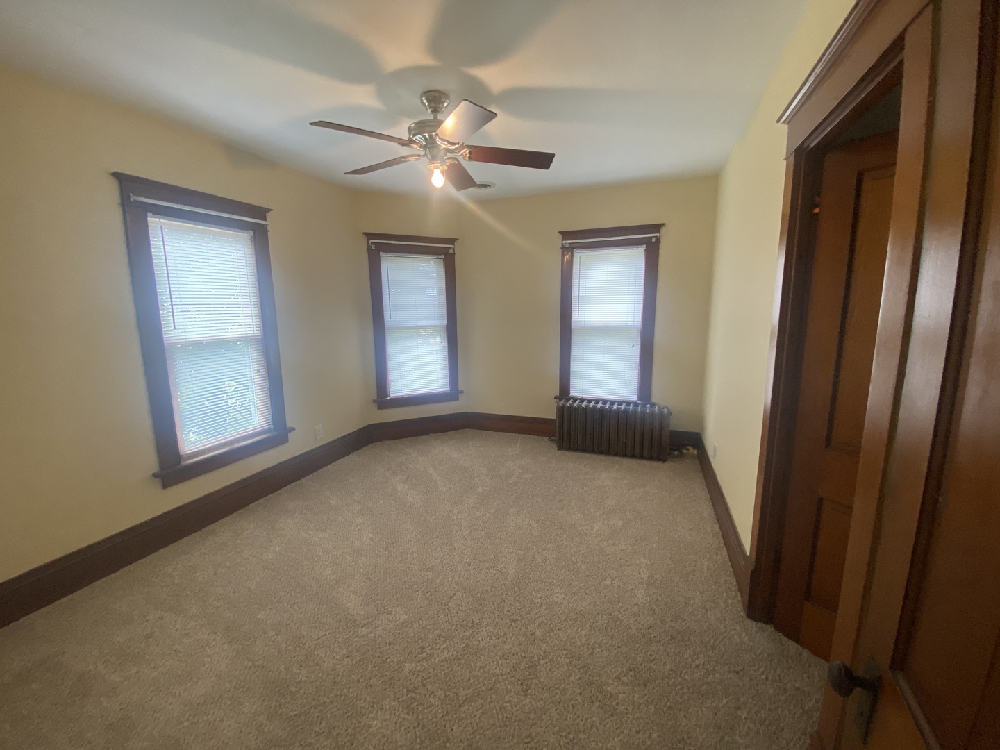 4684 Perry Road Malta, IL 60150 - Photo 16 of 36 a living room with furniture and a flat screen tv