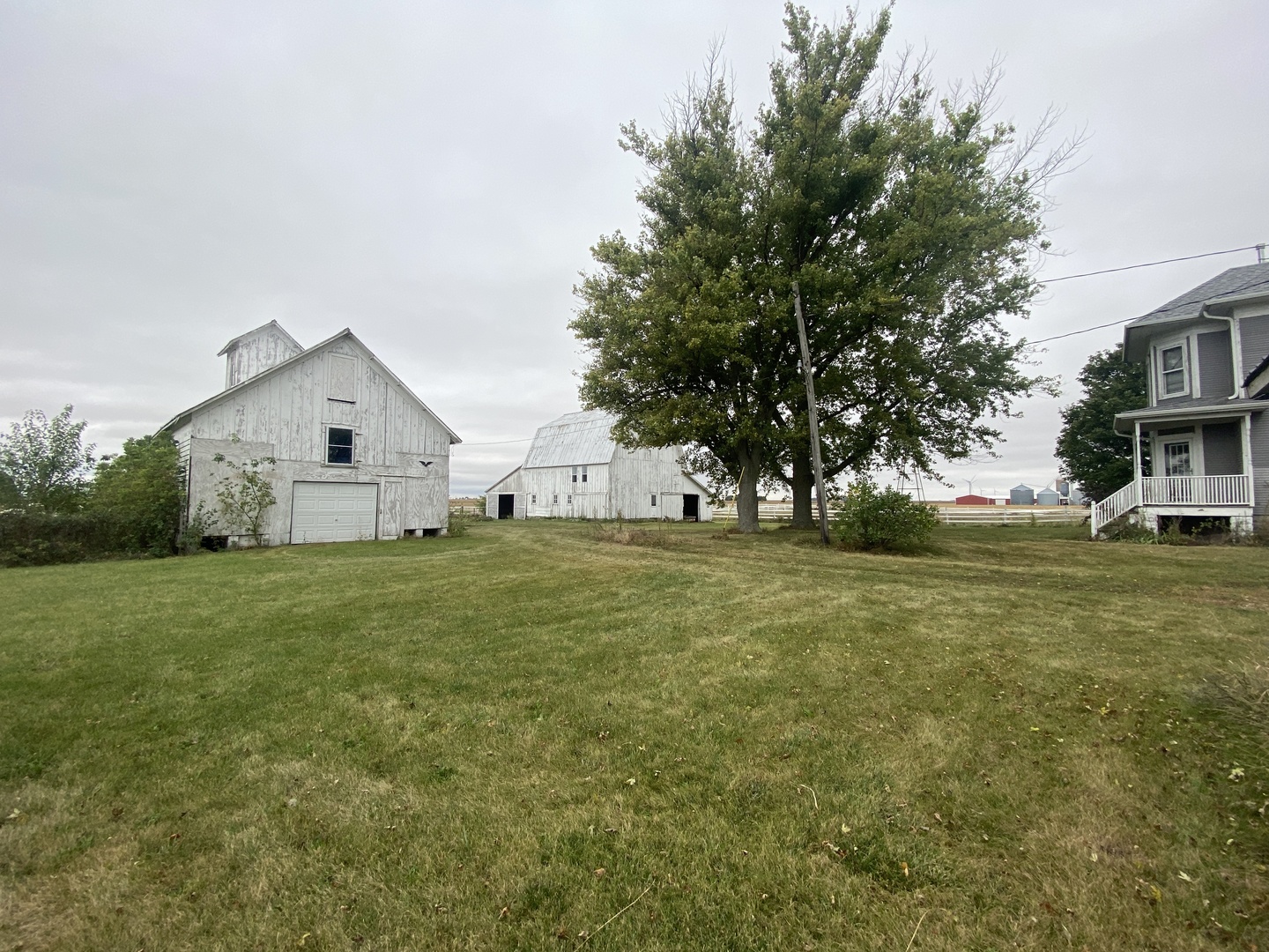 4684 Perry Road Malta, IL 60150 - Photo 24 of 36 a front view of house with yard and trees
