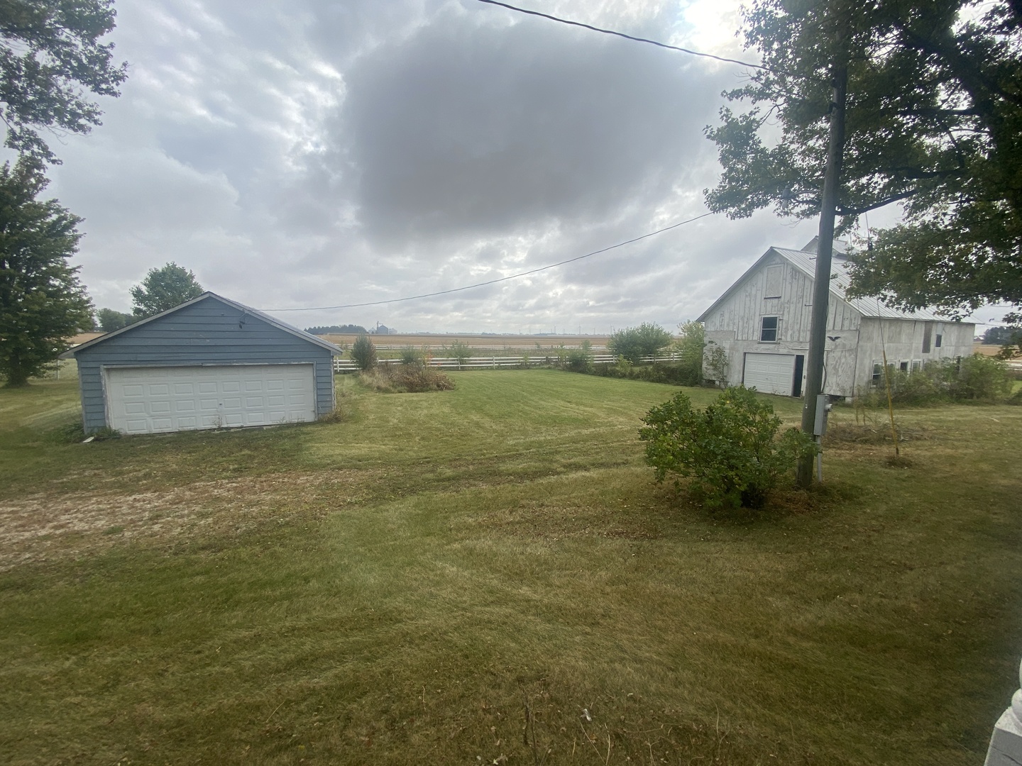 4684 Perry Road Malta, IL 60150 - Photo 6 of 36 a view of a house with a yard