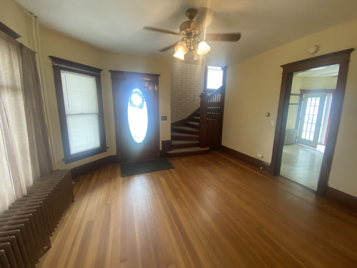 4684 Perry Road Malta, IL 60150 - Photo 8 of 36 wooden floor in an empty room with a mirror