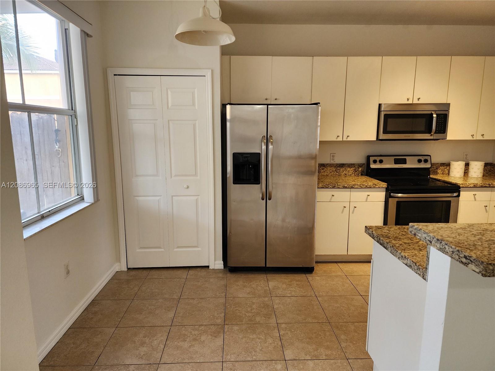 10831 Southwest 240th Lane Homestead, FL 33032 - Photo 7 of 33 Gallery Image 7
