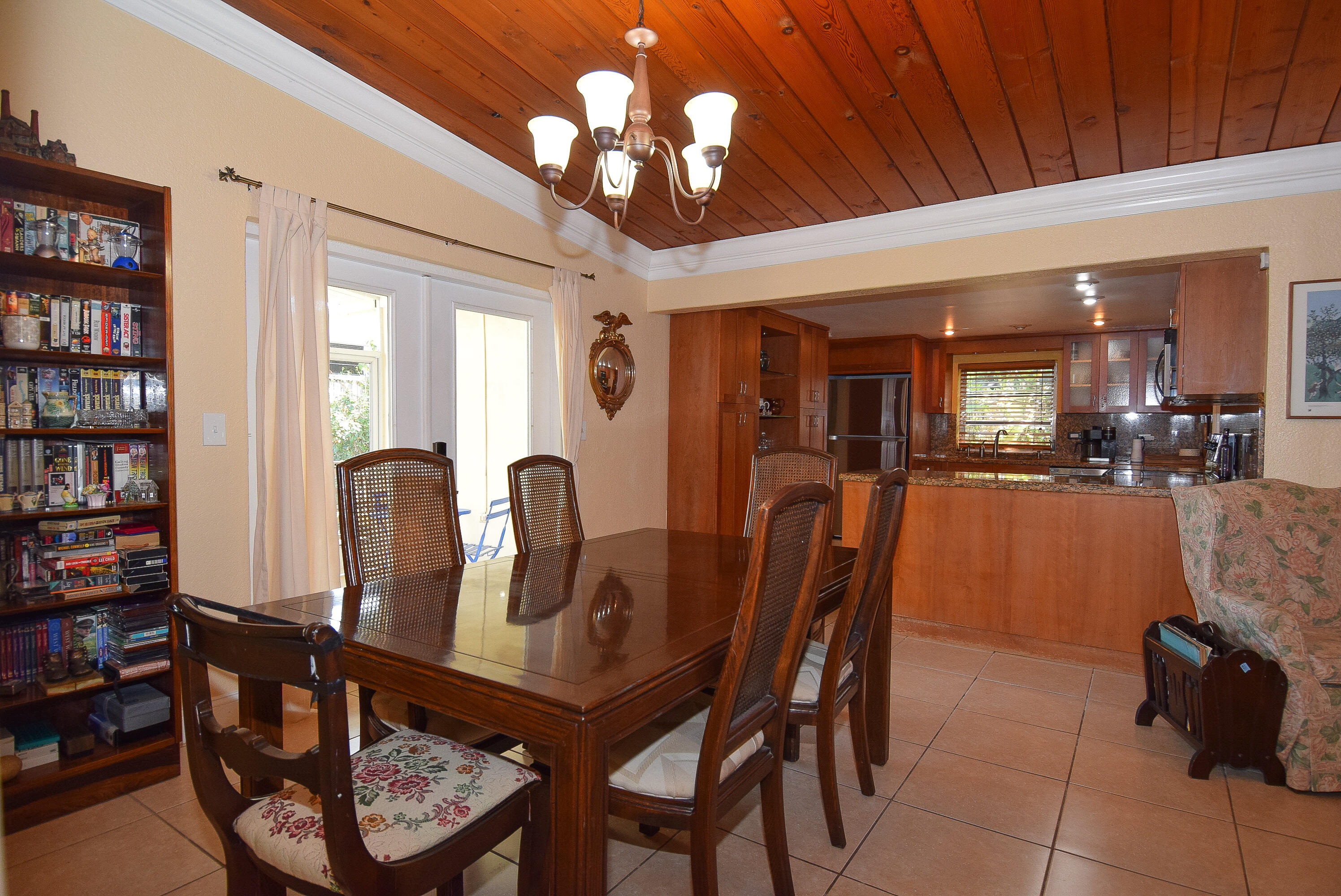 334 3rd Road Key Largo, FL 33037 - Photo 12 of 30 a dining room with furniture and chandelier