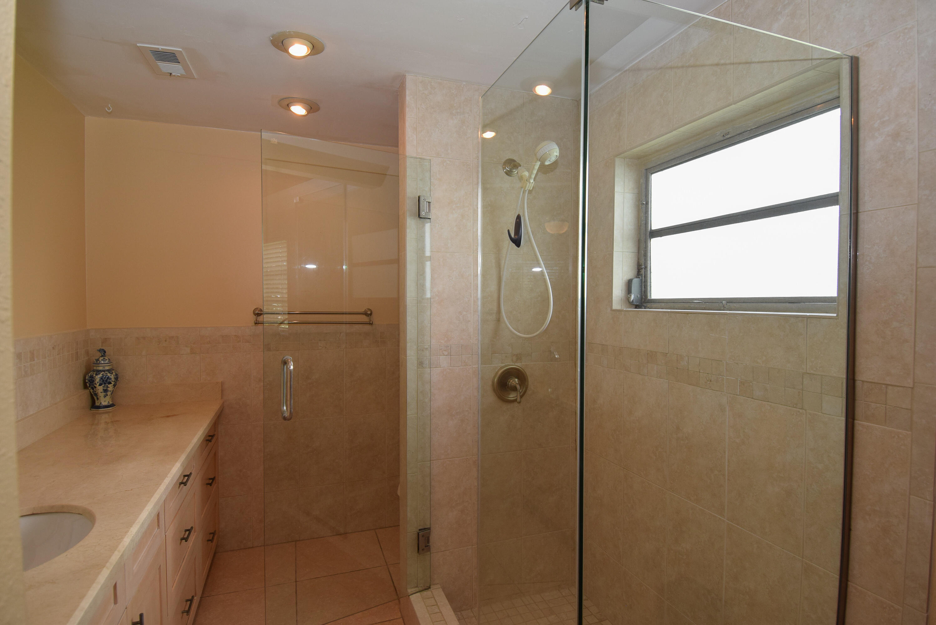 334 3rd Road Key Largo, FL 33037 - Photo 19 of 30 a bathroom with a shower and a sink