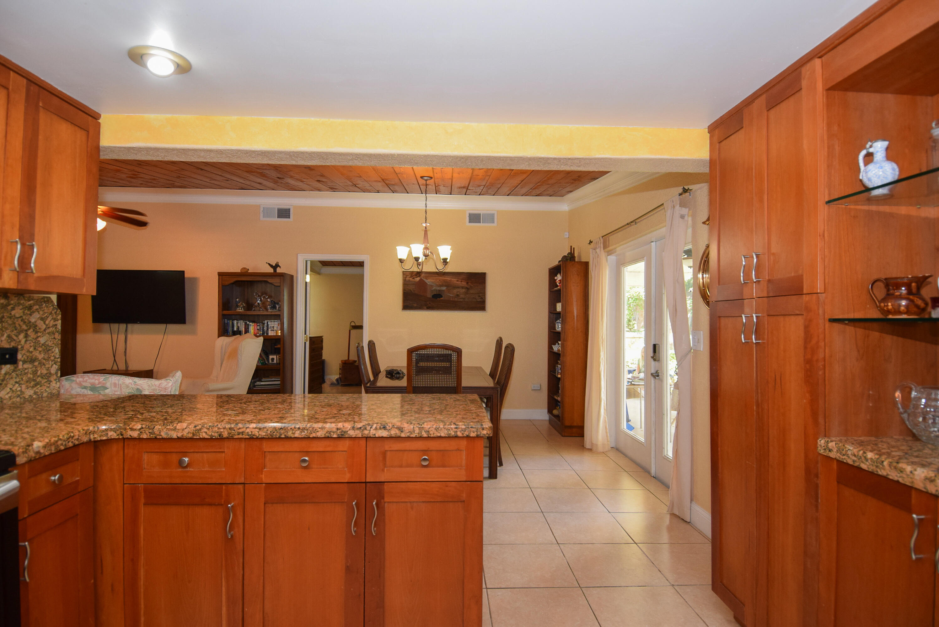334 3rd Road Key Largo, FL 33037 - Photo 6 of 30 a bathroom with a granite countertop sink and a mirror