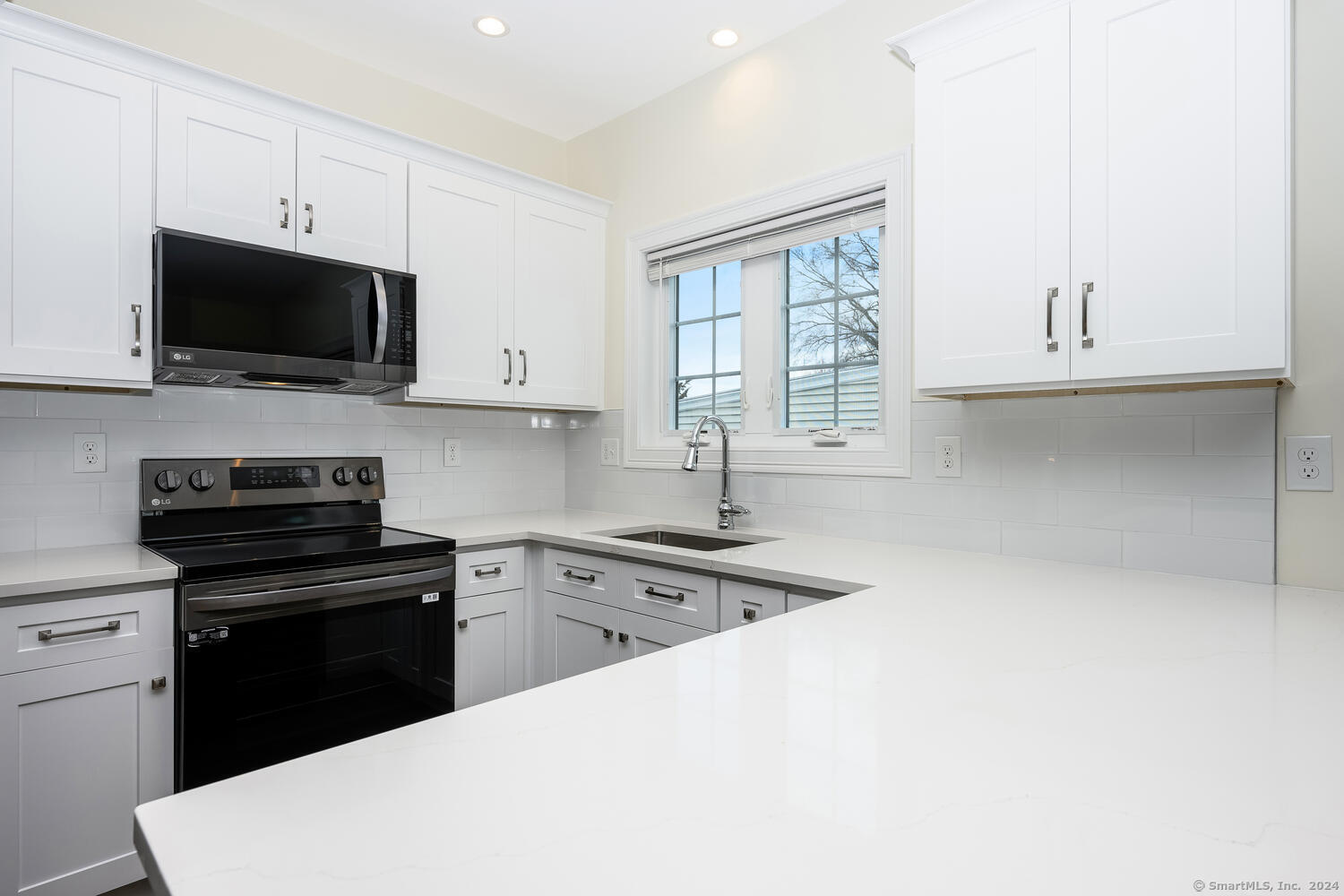 2 Beacon Square, Unit 3 Fairfield, CT 06825 - Photo 13 of 33 Beautiful quartz counters and all new appliances.