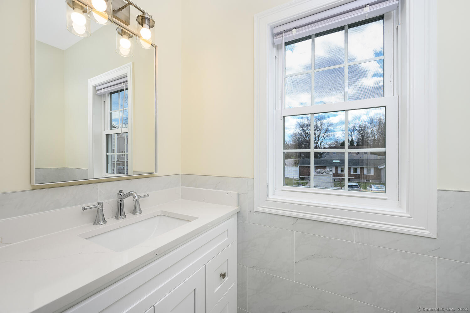2 Beacon Square, Unit 3 Fairfield, CT 06825 - Photo 16 of 33 A glimpse of the powder room on the main living level.