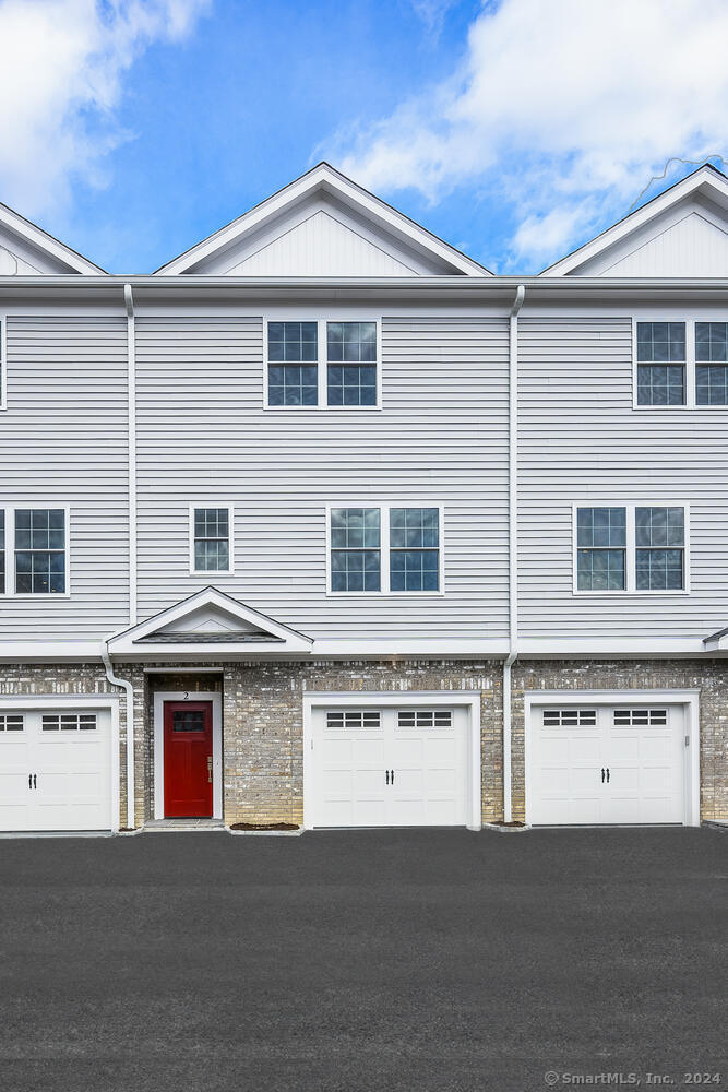 2 Beacon Square, Unit 3 Fairfield, CT 06825 - Photo 2 of 33 Each townhouse has a private single car garage.