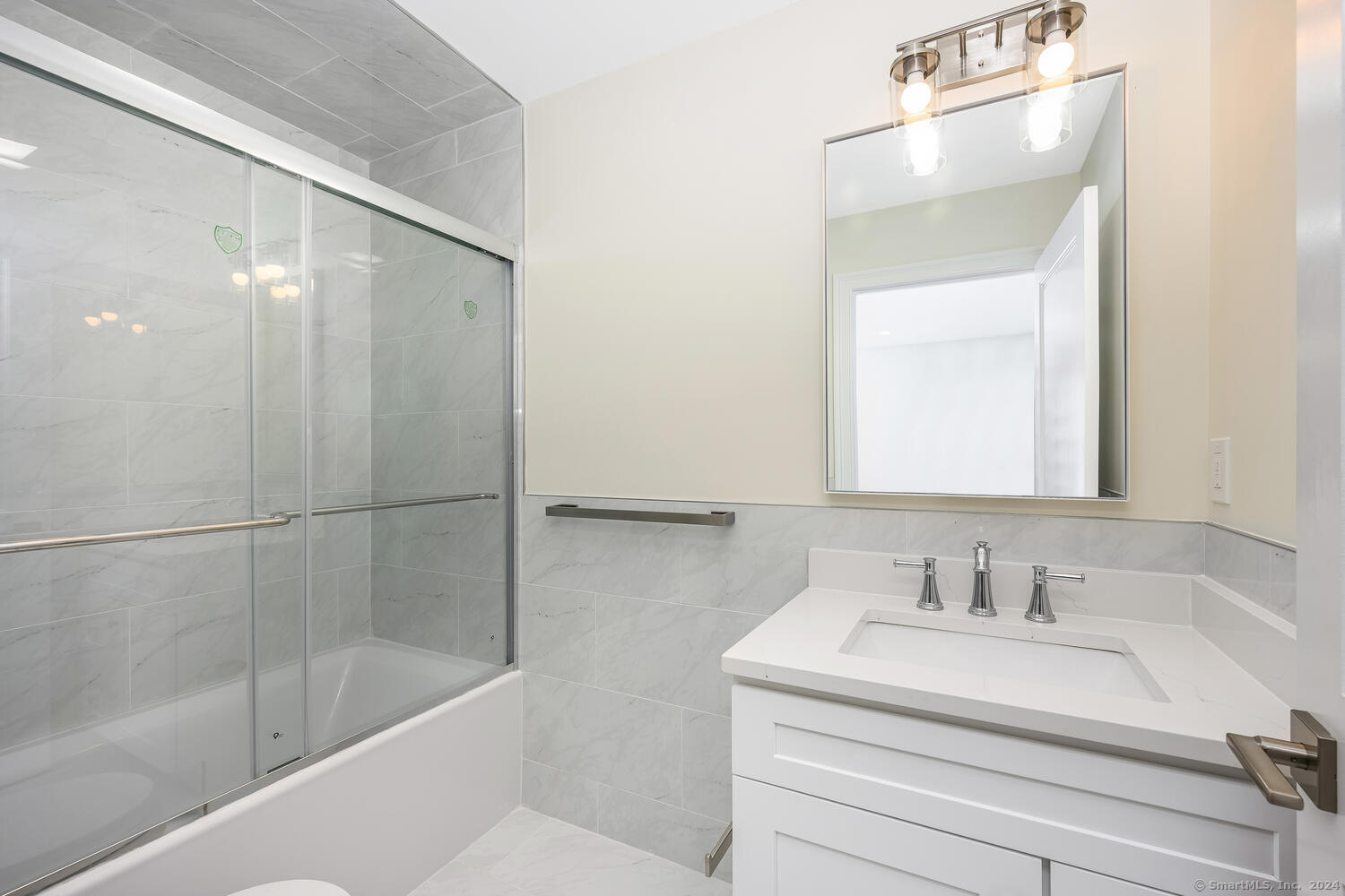 2 Beacon Square, Unit 3 Fairfield, CT 06825 - Photo 26 of 33 This bathroom has a tub / shower.