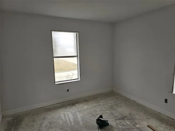 an empty room with a window