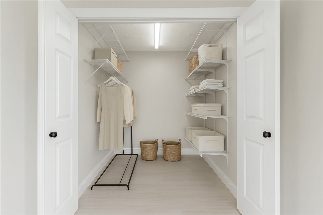 465 East Waverly Place, Unit 8B Vero Beach, FL 32960 - Photo 14 of 28 a view of a walk in closet