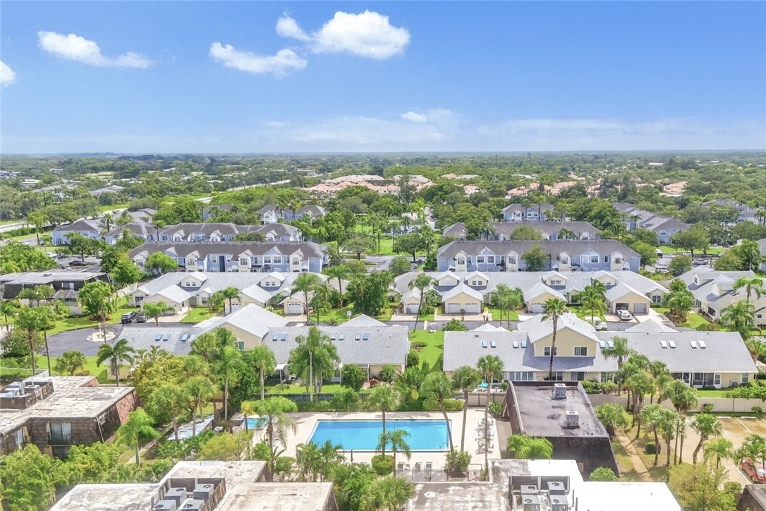 465 East Waverly Place, Unit 8B Vero Beach, FL 32960 - Photo 24 of 28 an aerial view of residential houses with outdoor space and street view
