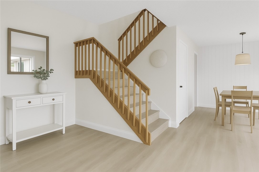 465 East Waverly Place, Unit 8B Vero Beach, FL 32960 - Photo 5 of 28 a view of a livingroom with furniture and stairs