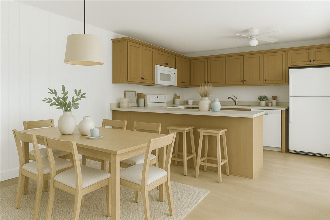 465 East Waverly Place, Unit 8B Vero Beach, FL 32960 - Photo 6 of 28 a dining table with a sink and a refrigerator