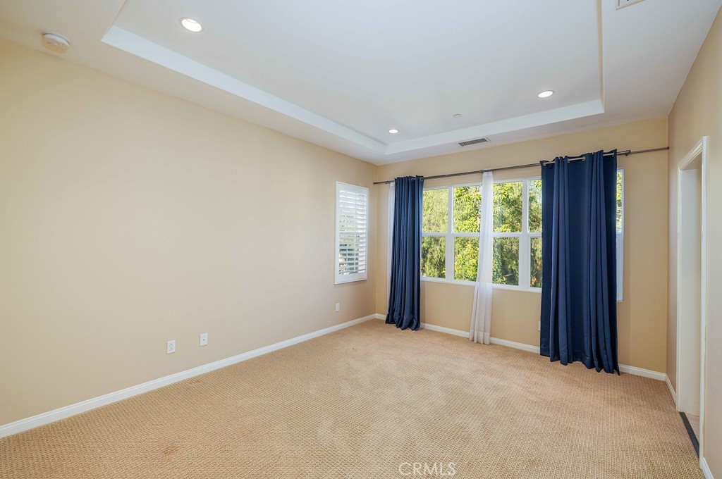 125 Waterleaf Irvine, CA 92620 - Photo 13 of 20 a view of an empty room with a window