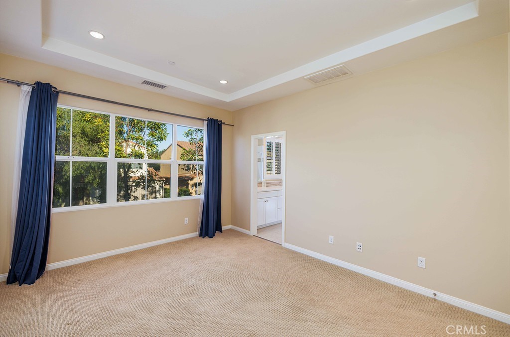 125 Waterleaf Irvine, CA 92620 - Photo 14 of 20 a view of an empty room with a window