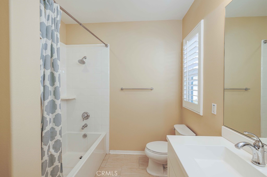 125 Waterleaf Irvine, CA 92620 - Photo 18 of 20 a bathroom with a sink toilet and shower