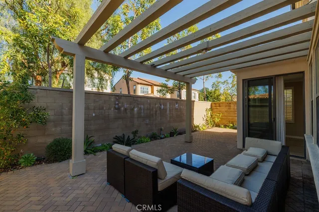 a view of backyard with seating space