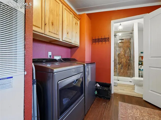 a utility room with dryer and washer