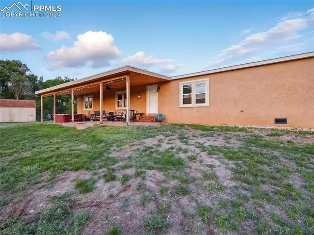 a front view of house with yard