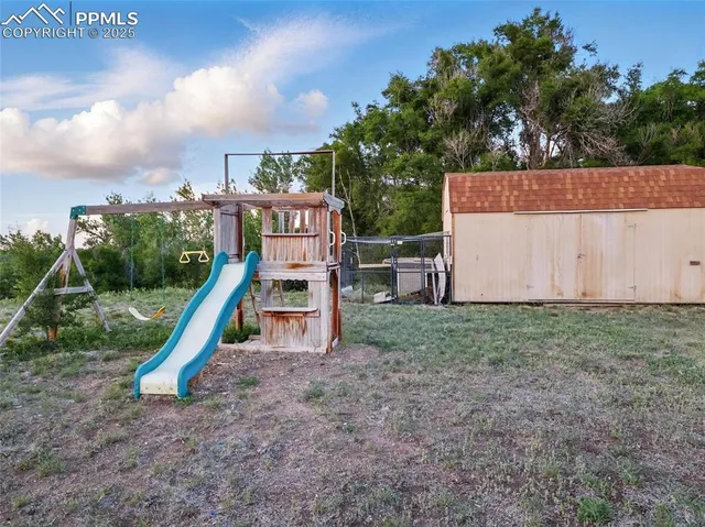 a view of a house with a park