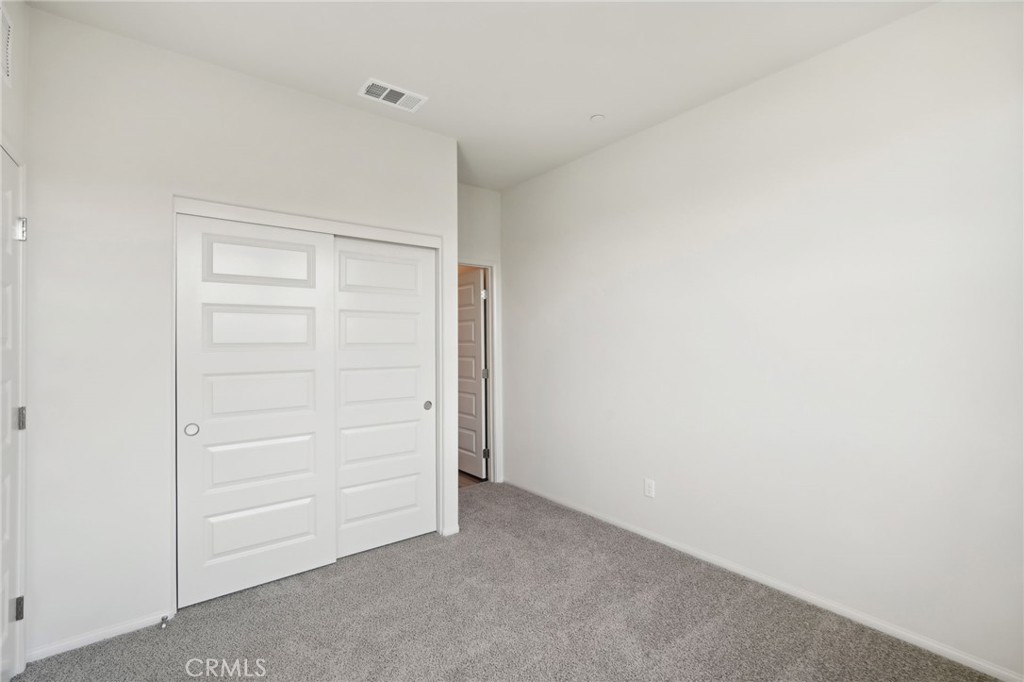 28022 Melrose Drive Temecula, CA 92591 - Photo 18 of 35 a view of an empty walk in closet