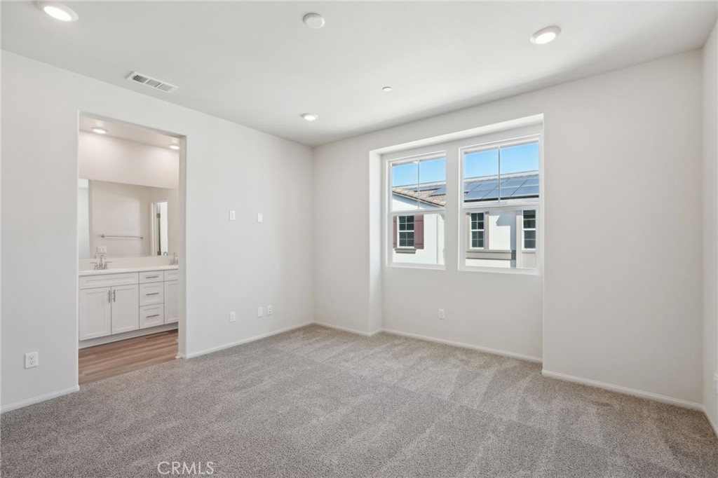 28022 Melrose Drive Temecula, CA 92591 - Photo 24 of 35 an empty room with windows and closet