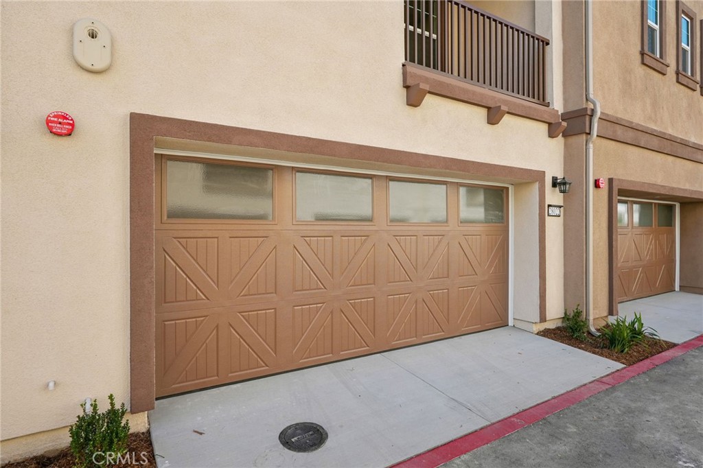 28022 Melrose Drive Temecula, CA 92591 - Photo 6 of 35 a front view of a house with entryway