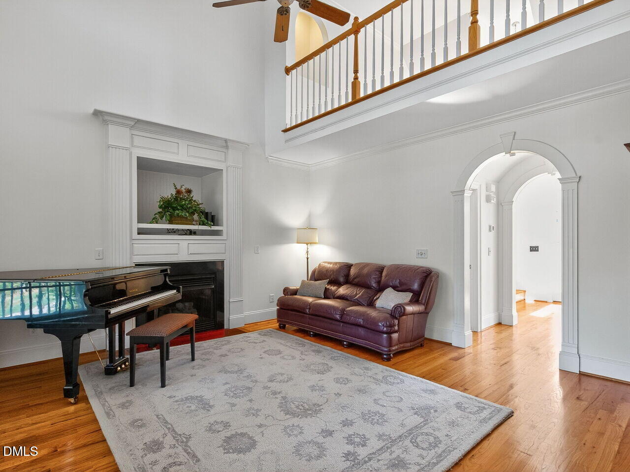 260 Marcellus Way Clayton, NC 27527 - Photo 12 of 47 a living room with furniture and a wooden floor