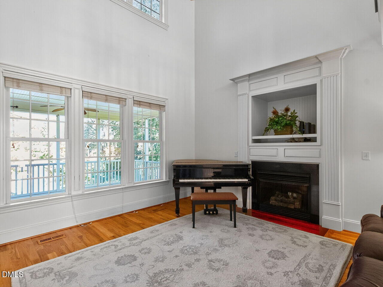 260 Marcellus Way Clayton, NC 27527 - Photo 13 of 47 a living room with furniture and a fireplace