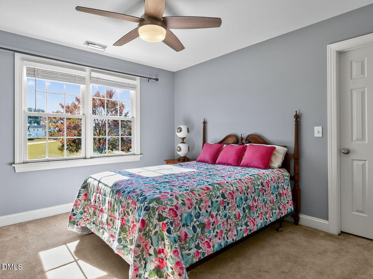 260 Marcellus Way Clayton, NC 27527 - Photo 28 of 47 a bedroom with a bed and window