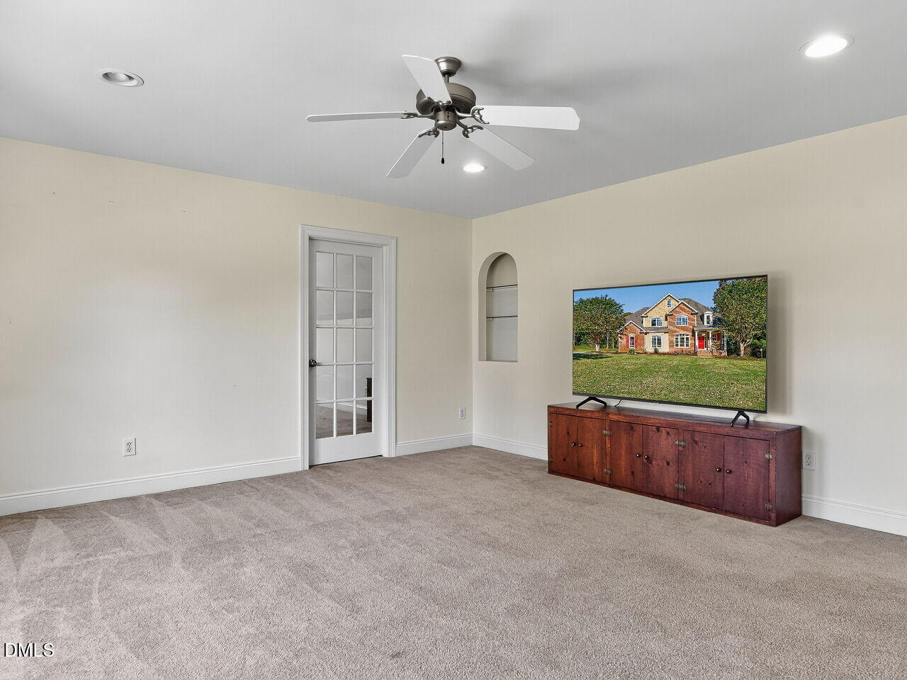 260 Marcellus Way Clayton, NC 27527 - Photo 30 of 47 wooden floor in an empty room with a window