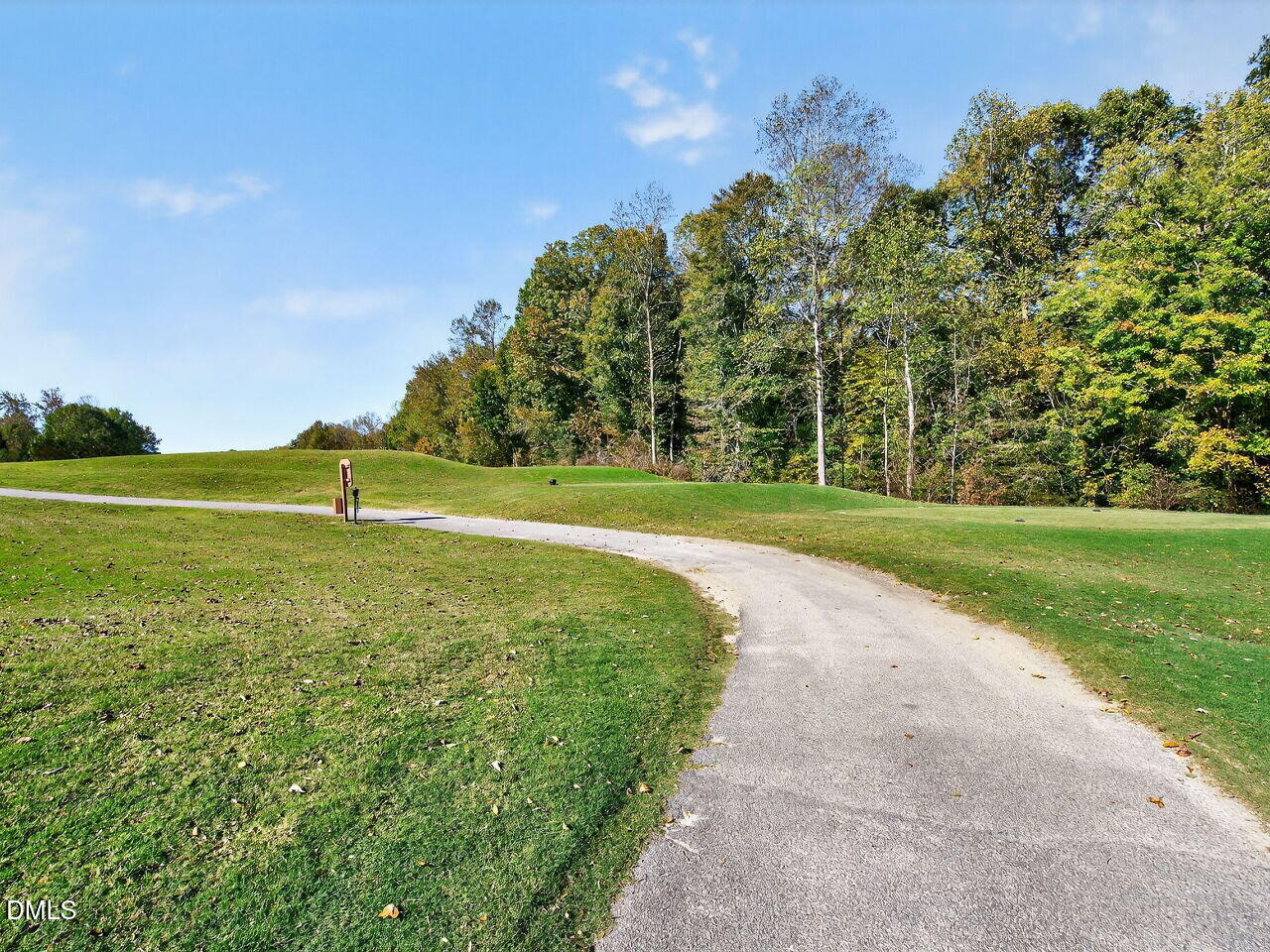 260 Marcellus Way Clayton, NC 27527 - Photo 36 of 47 a view of a field with an trees