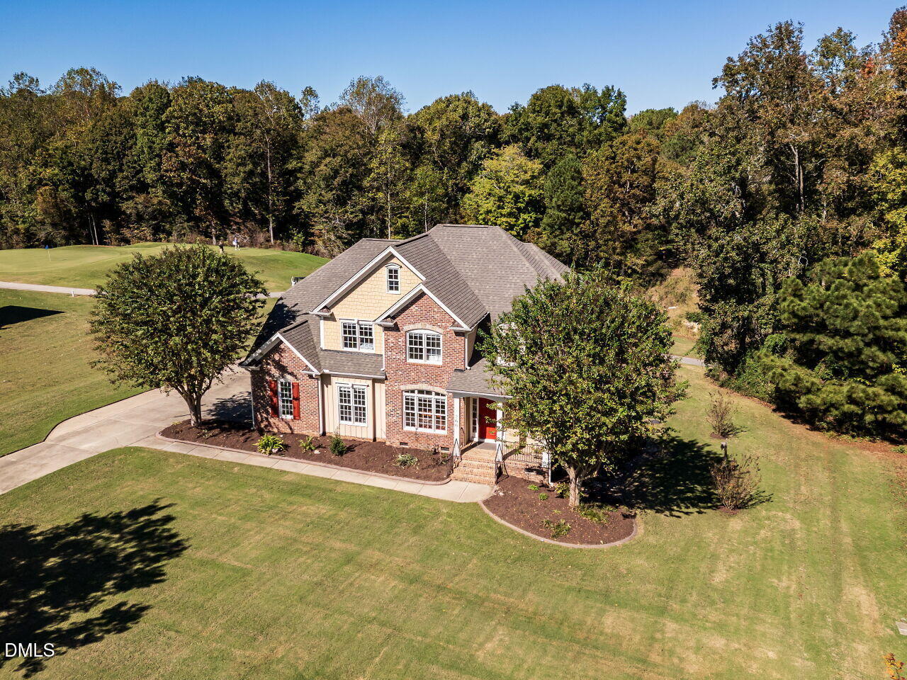 260 Marcellus Way Clayton, NC 27527 - Photo 40 of 47 a view of a house with a yard and sitting area