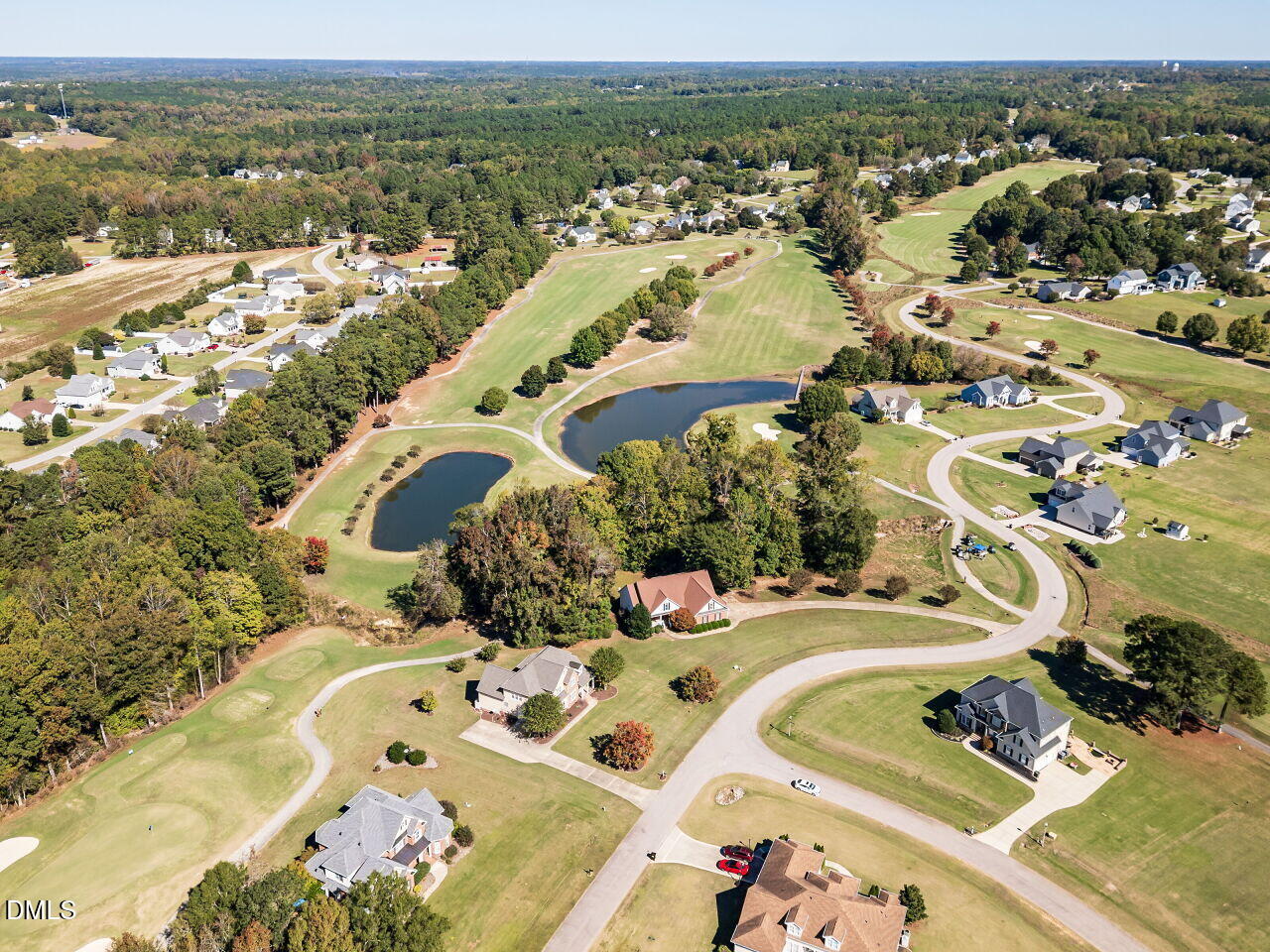 260 Marcellus Way Clayton, NC 27527 - Photo 46 of 47 an aerial view of residential houses with outdoor space