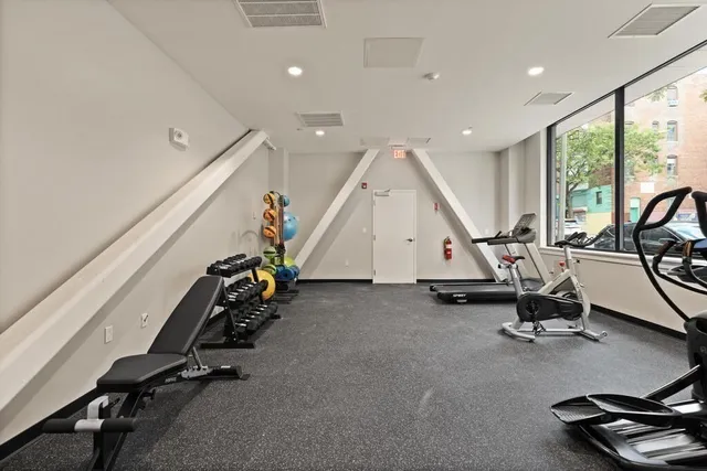 a view of a room with gym equipment