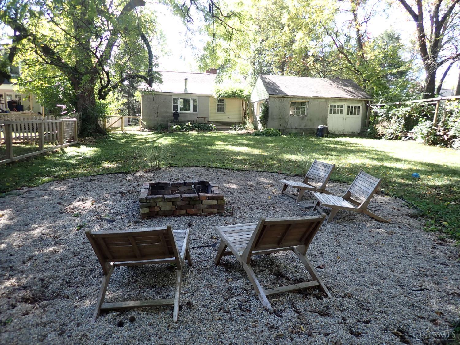 94 West Sharon Road Glendale, OH 45246 - Photo 32 of 44 Firepit area in fenced rear yard for year-round enjoyment.